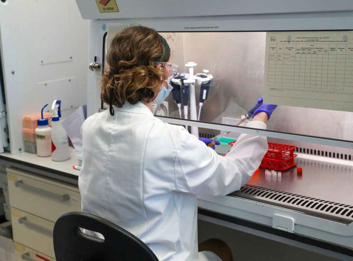 A scientist is seen working in a file photo taken at the Churchill Hospital in Oxford, west of London on June 24, 2020. (Steve Parsons/POOL/AFP via Getty Images)