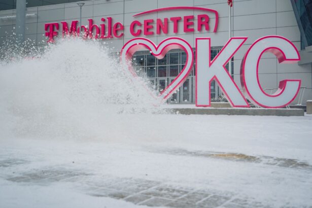 A snow machine clears a sidewalk outside the T-Mobile Center in Kansas City, Miss., on Feb. 7, 2021. (Kyle Rivas/Getty Images)