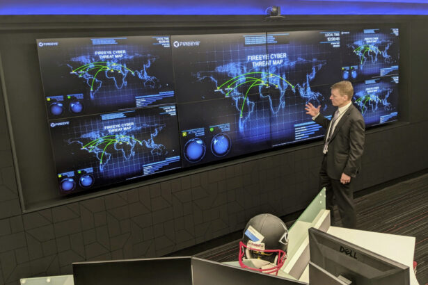 The CEO of FireEye Kevin Mandia gives a tour of the cybersecurity company's unused office space in Reston, Va. on Tuesday, March 9, 2021. (Nathan Ellgren/AP Photo)