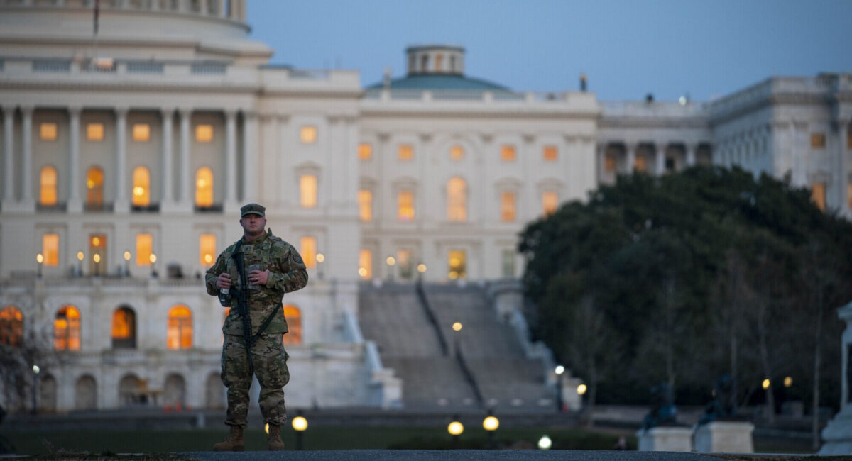 A member of the National Guard patrols outside of the U.S. Capitol in Washington, D.C., on March 8, 2021. (Sarah Silbiger/Getty Images)
