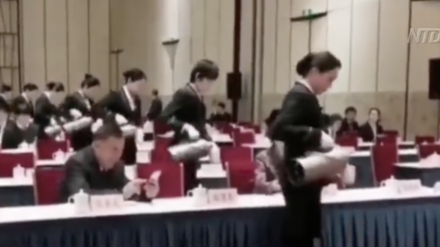 Robotic Waitstaff Serve Tea at Political Meeting in China