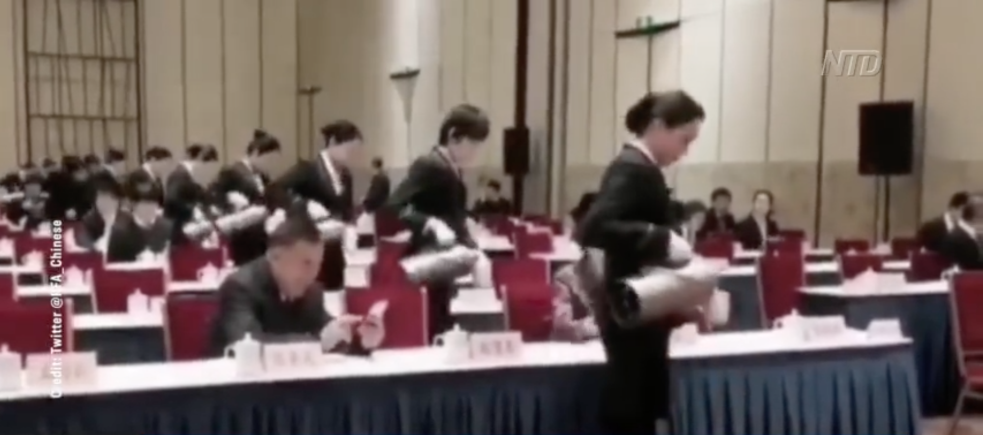 Robotic Waitstaff Serve Tea at Political Meeting in China