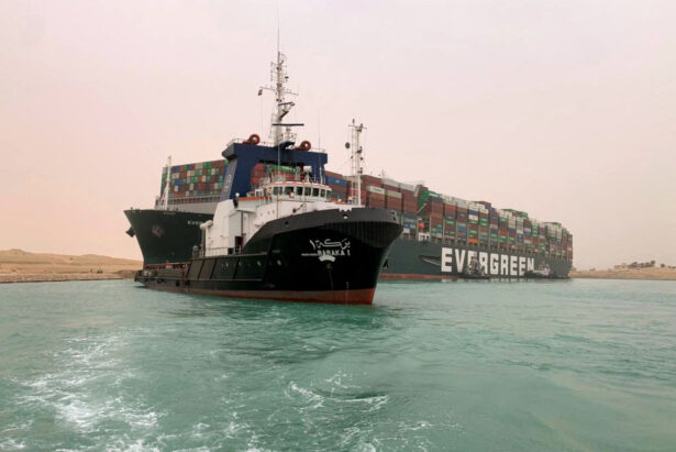 A part of the Taiwan-owned MV Ever Given (Evergreen), a 400-meter (1,300-foot-) long and 59-meter wide vessel, lodged sideways and impeding all traffic across the waterway of Egypt’s Suez Canal, on March 24, 2021. (Suez Canal Authority/Handout/AFP via Getty Images)