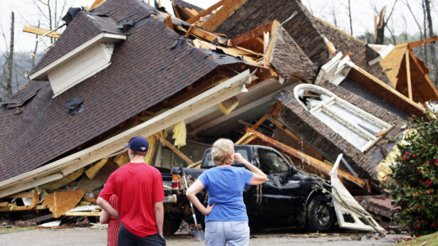 Residents survey damage to homes