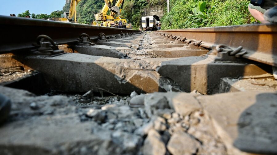 Relatives Mourn Victims of Taiwan Train Crash