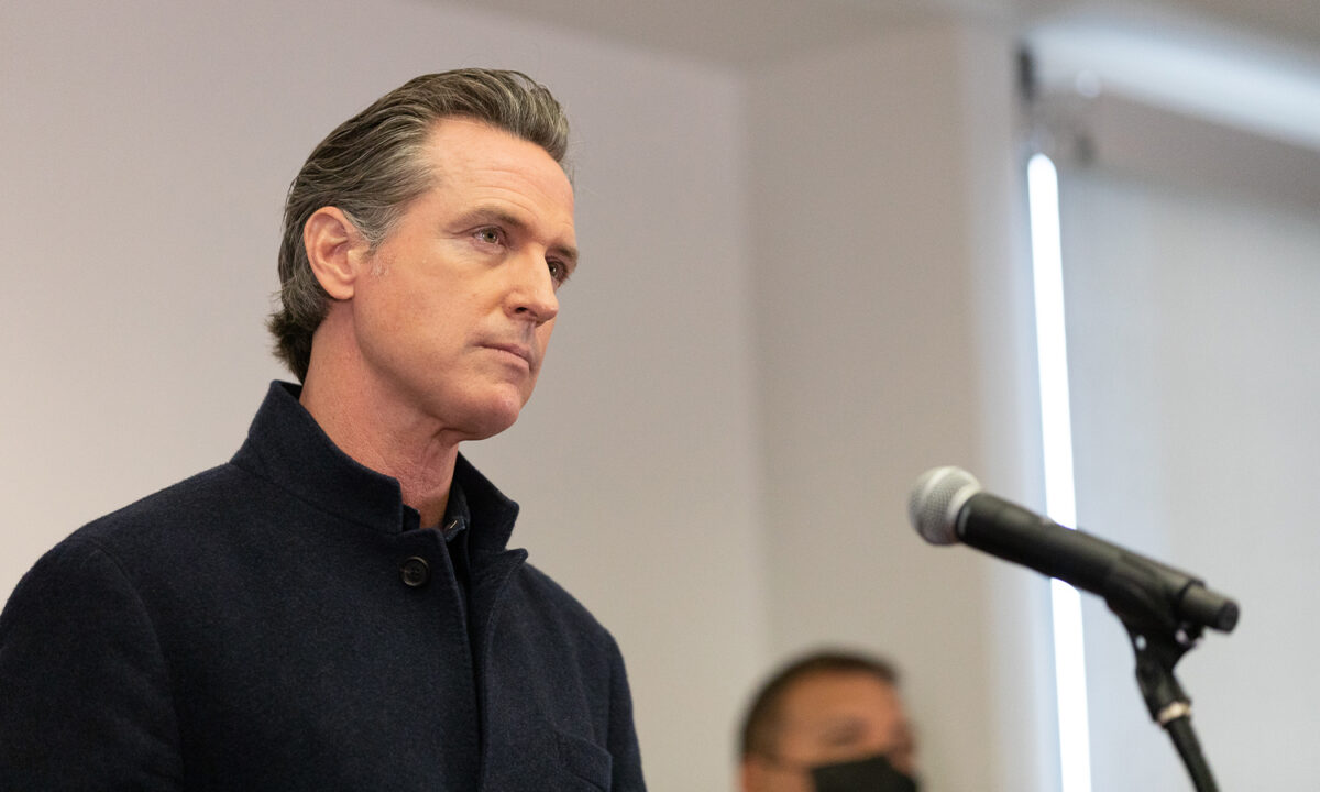 California Gov. Gavin Newsom speaks to reporters at AltaMed Urgent Care in Santa Ana, Calif., on March 25, 2021. (John Fredricks/The Epoch Times)