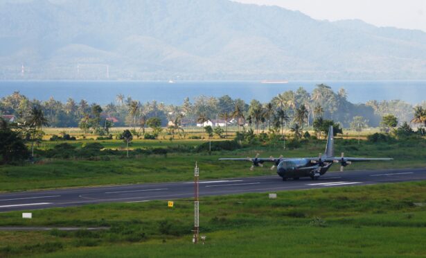 An Indonesia Air Force plane arrives at Banyuwangi Airport to deliver equipment as the search continues for the missing KRI Nanggala-402 submarine, in Banyuwangi, East Java Province, Indonesia, on April 23, 2021. (Ajeng Dinar Ulfiana/Reuters)