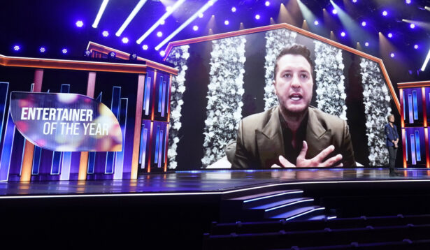 Luke Bryan appears on screen accepting the award for entertainer of the year at the 56th annual Academy of Country Music Awards at the Grand Ole Opry in Nashville, Tenn., on April 18, 2021. (Mark Humphrey/AP Photo)