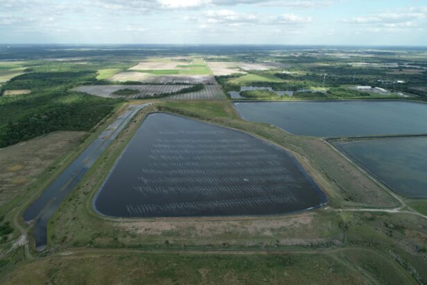 A reservoir of an old phosphate plant, the site of a breach which is leaking polluted water into the surrounding area, prompting an evacuation order in Manatee County, is seen in an aerial photograph taken in Piney Point, Fla., on April 3, 2021. (Drone Base/Reuters)
