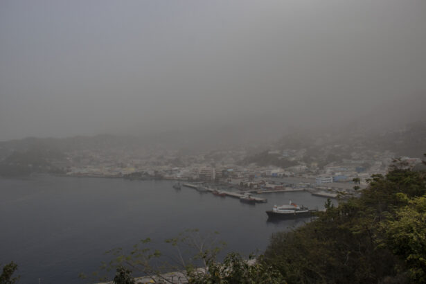 A cloud of volcanic ash hovers over Kingstown, on the eastern Caribbean island of St. Vincent, on April 10, 2021, a day after the La Soufriere volcano erupted. (Lucanus Ollivierre/AP Photo)