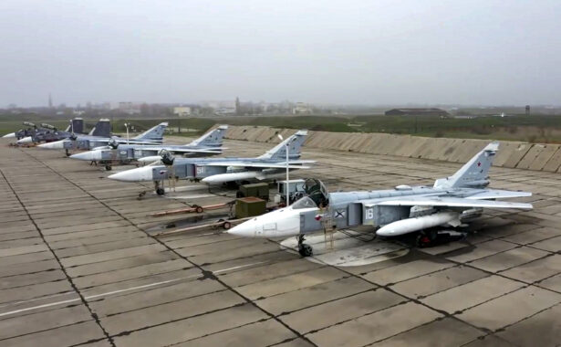 Russian Su-24 bombers parked at an air base in Crimea in preparation for maneuvers, in a photo released on April 22, 2021. (Russian Defense Ministry Press Service via AP)