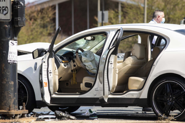 Chicago police investigate in the northbound lanes of Lake Shore Drive at East Monroe Street, where a 2-year-old boy was shot in the head while he was traveling inside a car near Grant Park, Ill., on April 6, 2021. (Ashlee Rezin Garcia/Chicago Sun-Times via AP)