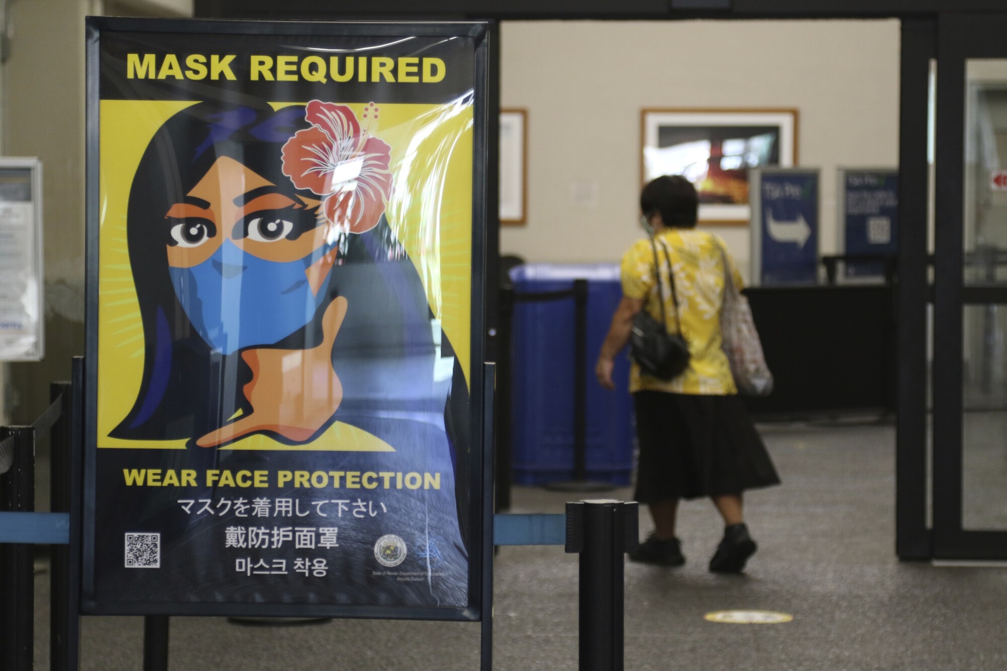 US Keeps in Place Mask Requirement on Planes, Transit