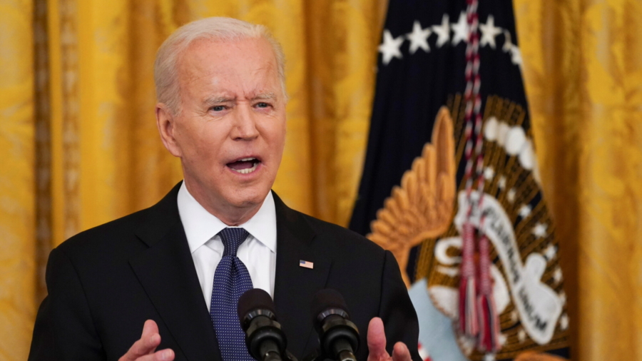 Biden Signs COVID-19 Hate Crimes Bill Into Law