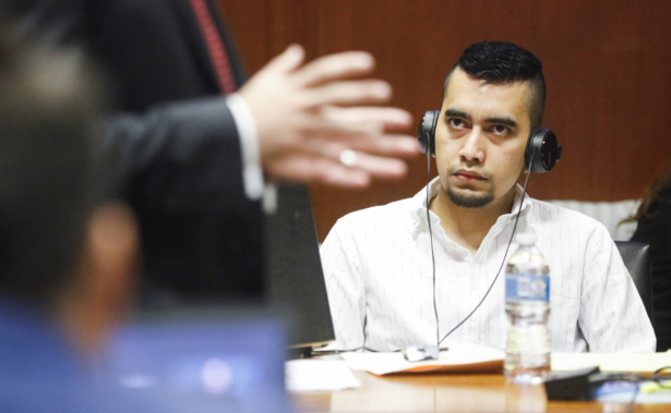 Cristhian Bahena Rivera listens to Poweshiek County Attorney Bart Klaver give his opening statement at his trial at the Scott County Courthouse in Davenport, Iowa, on May 19, 2021. (Jim Slosiarek/The Gazette via AP, Pool)