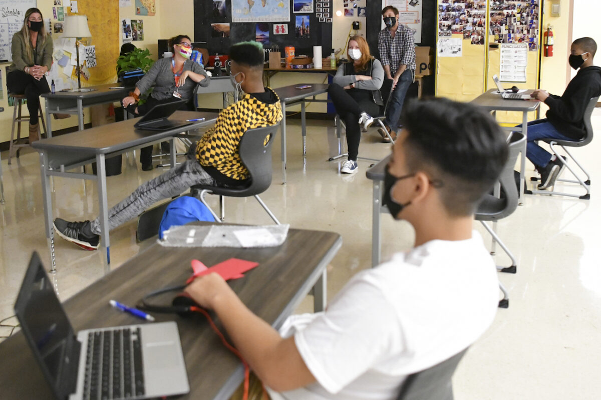 Students attend in-person instruction at a U.S. high school in a file photo in April 2020. (Rodin Eckenroth/Getty Images)