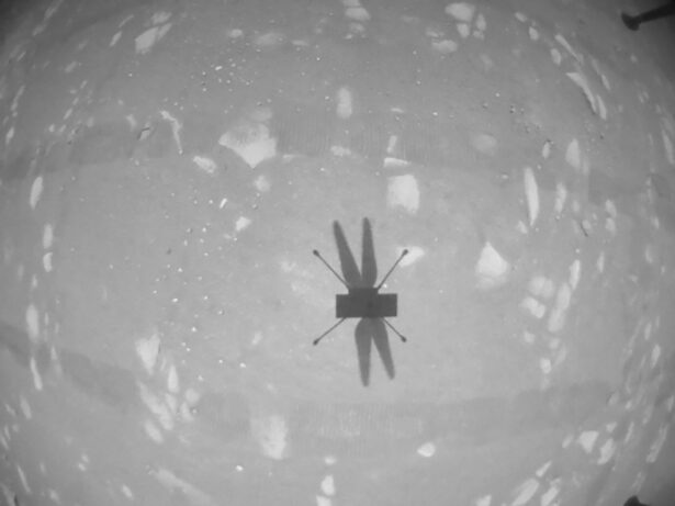 The shadow of NASA's Mars helicopter Ingenuity is seen during its second flight, captured by its black-and-white navigation camera, on April 22, 2021. (NASA/JPL-Caltech/Handout via Reuters)