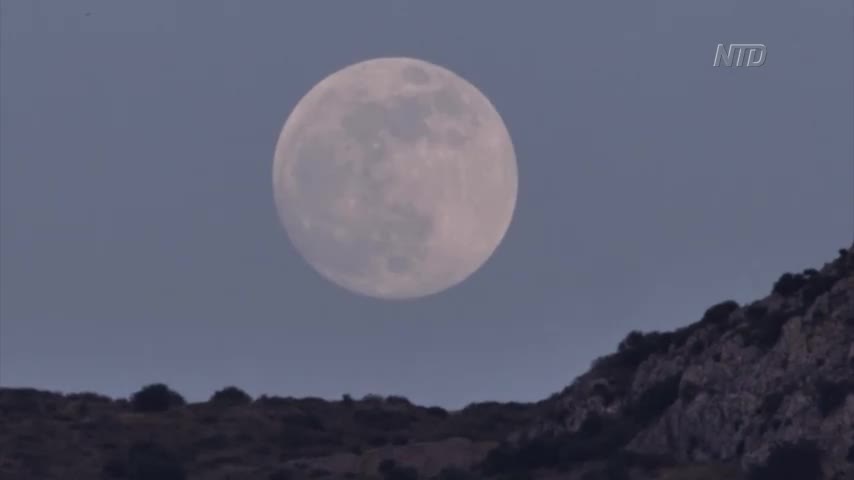 Flower Moon Hangs Over Ruins of Corinth
