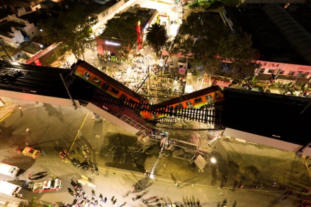 A general view of damage caused after a railway overpass and train collapsed onto a busy road in Mexico City, Mexico, on May 4, 2021. (Instagram@CSDRONES/via Reuters)