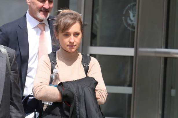 Actress Allison Mack departs the Brooklyn Federal Courthouse after facing charges regarding sex trafficking and racketeering related to the Nxivm cult case in New York, N.Y., on April 8, 2019. (Shannon Stapleton/REUTERS)