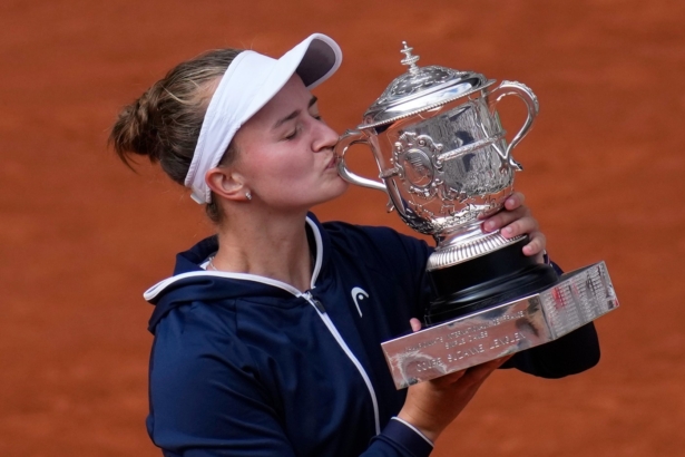 Czech Republic's Barbora Krejcikova kisses the cup after defeating Russia's Anastasia Pavlyuchenkova in their final match of the French Open tennis tournament at the Roland Garros stadium in Paris, Frnace, on June 12, 2021. (Christophe Ena/AP Photo)