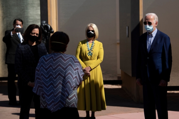 U.S. Democratic vice presidential nominee and senator from California, Kamala Harris, Cindy McCain (C) and Democratic presidential candidate former U.S. Vice President Joe Biden listen to tribal leaders and veterans speak at the American Indian Veterans National Memorial at the Heard Museum in Phoenix, Arizona, on Oct. 8, 2020. (Brendan Smialowski/AFP via Getty Images)