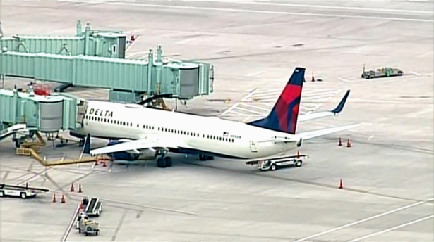 A Delta flight from Los Angeles International Airport bound for Nashville makes an emergency stop in Albuquerque, N.M., after a passenger attempted to breach the cockpit on June 4, 2021. (Courtesy of KOAT)