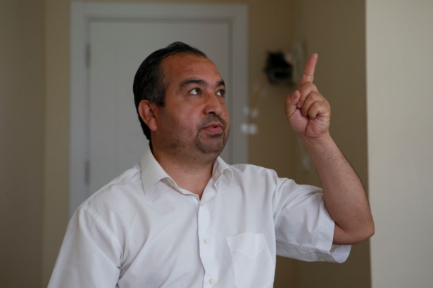 Mahmut Tevekkul gestures as he talks during a media interview in Istanbul, Turkey, on June 2, 2021. (Mehmet Guzel/AP Photo)