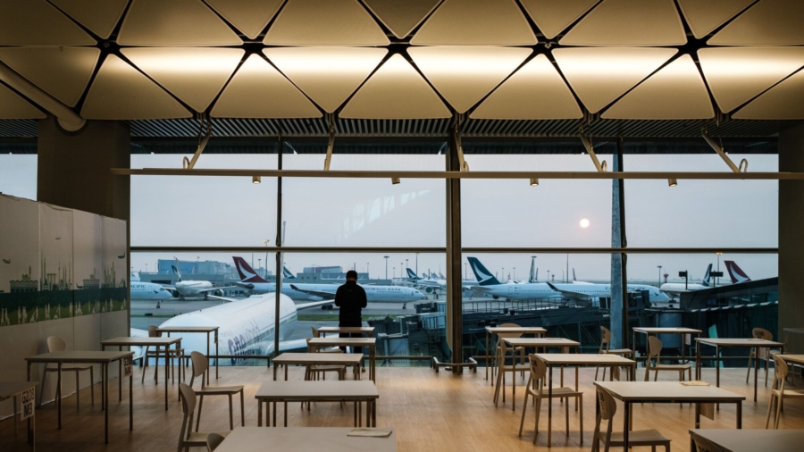 Hong Kong Bans Passenger Flights From UK to Curb COVID-19