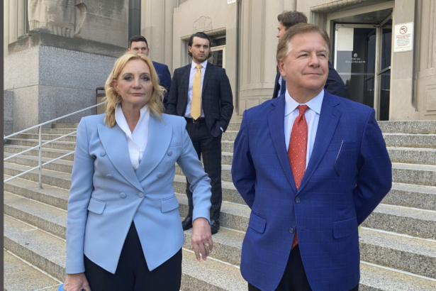 Patricia McCloskey and her husband Mark McCloskey leave court in St. Louis, Mo., on June 17, 2021. (Jim Salter/AP Photo)