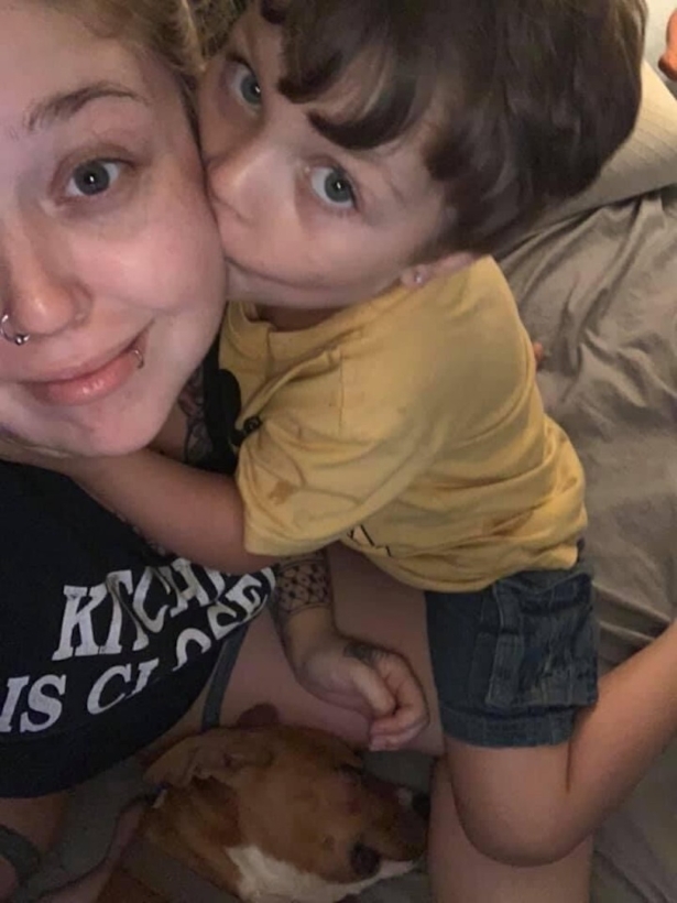 This photo provided by The Gonzalez Law Group shows Sarah Olson holding her son Samuel. (The Gonzalez Law Group via AP)