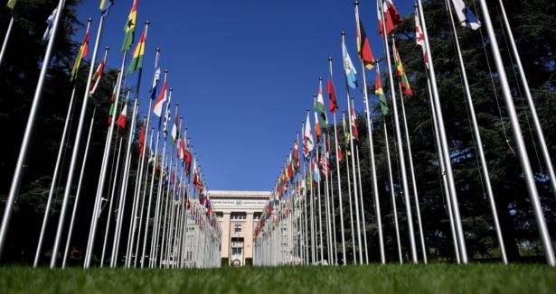 The "Palais des Nations," which houses the United Nations offices, is seen at the end of the flag-lined front lawn in Geneva on Sept. 4, 2018. (Fabrice Coffrini/AFP via Getty Images)