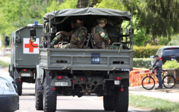 Body of Armed Belgian Fugitive Soldier Found, Suicide Suspected