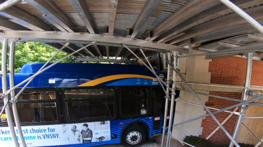 Passenger Bus Crashed, Stuck in Building