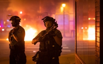 Unrest Erupts in Minneapolis Amid Protests Over Police-Involved Shooting