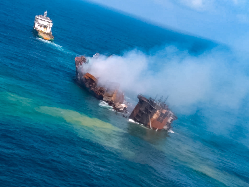 Smoke rises from a fire onboard the MV X-Press Pearl vessel as it sinks while being towed into deep sea off the Colombo Harbour, in Sri Lanka, on June 2, 2021. (Sri Lanka Airforce Media/via Reuters)