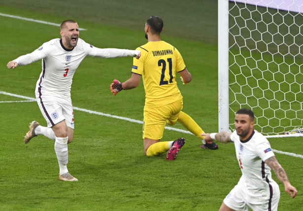 England's Luke Shaw (L) celebrates