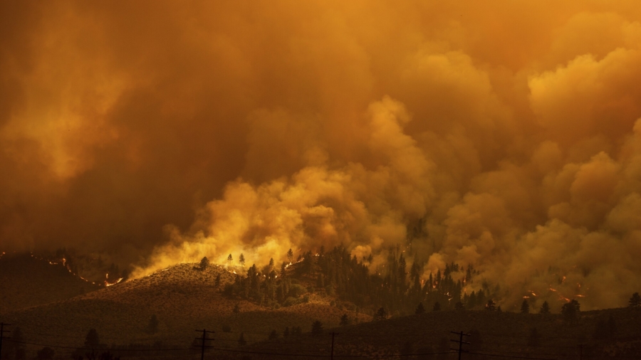 Fires Rage in Several States As Heat Wave Broils US West