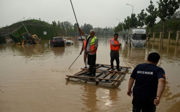 Floods in China: Family Washed Away by Mudslides