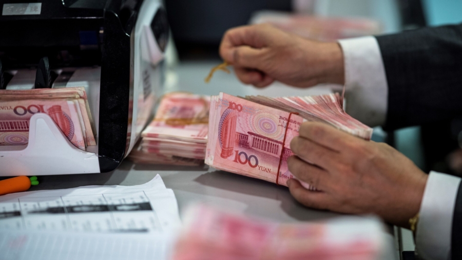 China’s Bank Regulator Warns of Rising Bad Loans Due to Uneven Recovery