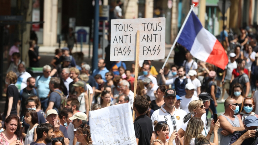 Vaccine Mandates Start, Protests Rage in Europe