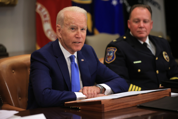 President Joe Biden hosts a meeting with Wilmington, Delaware, Police Chief Robert Tracy (L) about reducing gun violence in the Roosevelt Room at the White House in Washington, D.C., on July 12, 2021. (Chip Somodevilla/Getty Images)