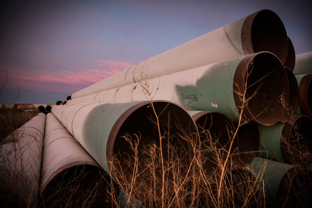Miles of unused pipe, prepared for the proposed Keystone XL pipeline, sit in a lot outside Gascoyne, N.D., on Oct. 14, 2014. (Andrew Burton/Getty Images)