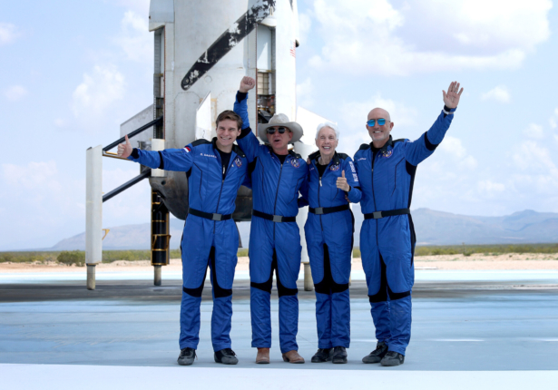 Blue Origin’s New Shepard crew (L–R) Oliver Daemen, Jeff Bezos, Wally Funk, and Mark Bezos pose for a picture after flying into space in the Blue Origin New Shepard in Van Horn, Texas, on July 20, 2021. (Joe Raedle/Getty Images)