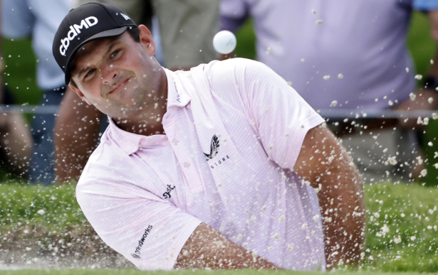 Patrick Reed plays a shot from a bunker on the fifth hole during the first round of the Charles Schwab Challenge golf tournament at the Colonial Country Club in Fort Worth, Texas on May 27, 2021. (Ron Jenkins/AP)