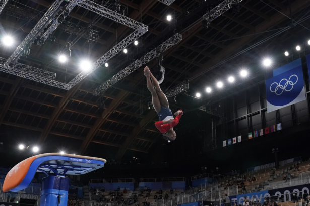 Simone Biles, of the United States, performs on the vault during the artistic gymnastics women's final at the 2020 Summer Olympics, on July 27, 2021, in Tokyo. (Ashley Landis/AP Photo)