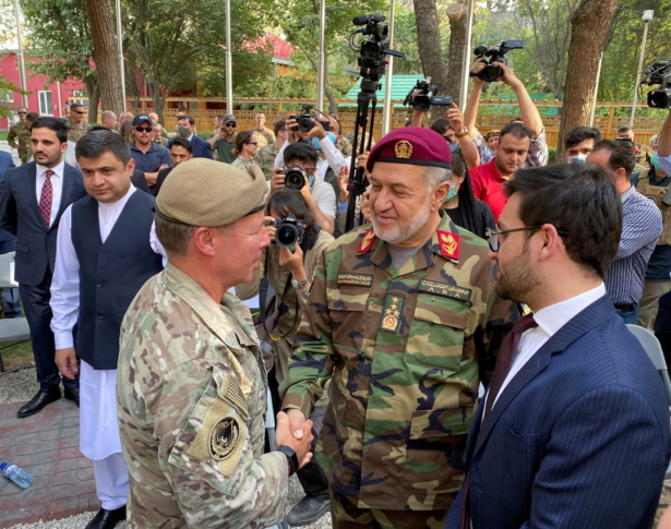 U.S. General Austin Miller (L) shakes hand with Afghan Defense Minister Bismillah Khan Mohammadi, at a ceremony in Kabul, as Miller relinquishes command during the final phase of America's withdrawal from the war in Afghanistan, on July 12, 2021. (Phil Stewart/Reuters)