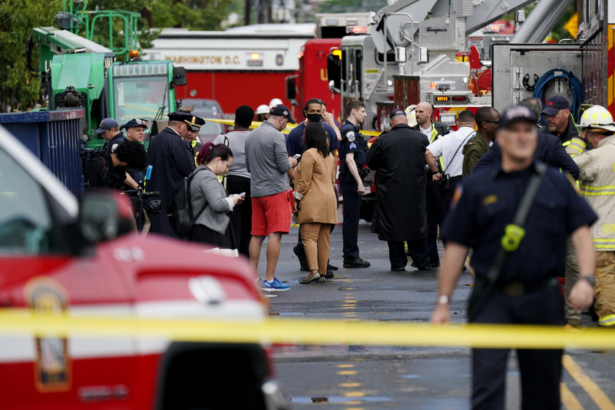 Emergency crews respond after a building under construction collapsed in Washington on July 1, 2021. (Carolyn Kaster/AP Photo)