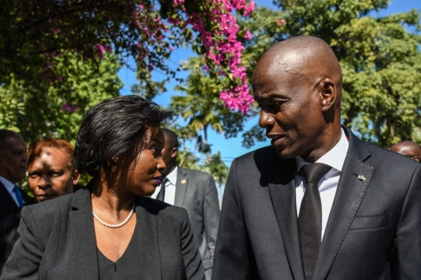 The late president of Haiti Jovenel Moise (R) arrives with the First Lady Martine Moise (L) for the official ceremony of Haiti's 10th earthquake anniversary in Port-au-Prince, on Jan. 12, 2020. (Chandan Khanna/AFP)