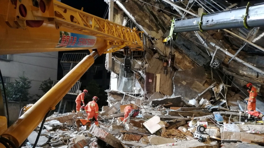 China Hotel Collapse Kills Eight; Rescuers Search for Nine Missing